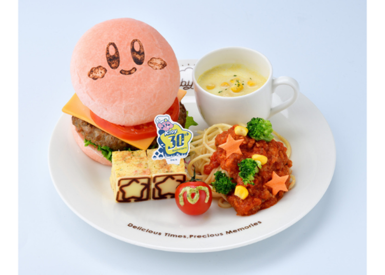 Kirby Burger & Meat Pasta with Warm Vegetables (30th Anniversary Version) カービィバーガー&ミートパスタ 温野菜のせ（30周年おめでとうバージョン）1,985 yen (tax included) (©Nintendo / HAL Laboratory, Inc.)