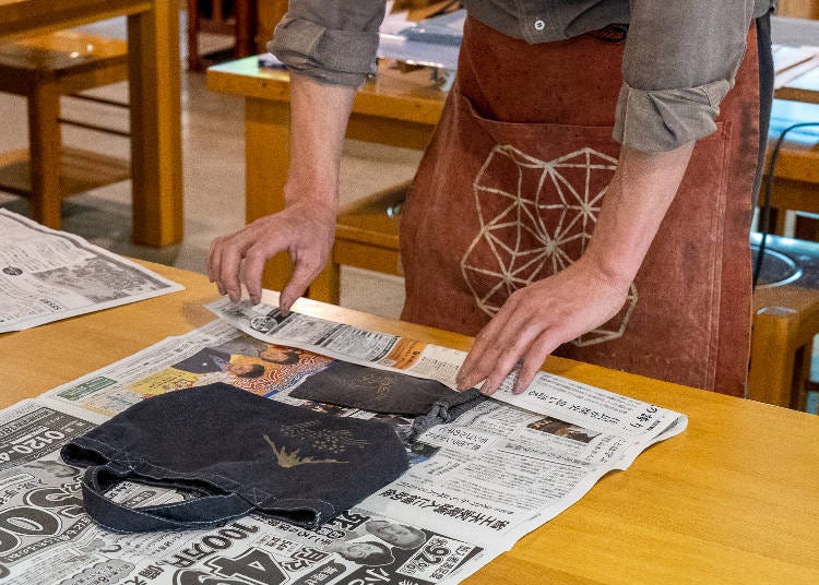 Since a craftsman or staff member will finish the ochazome process, the pieces are wrapped in newspaper.