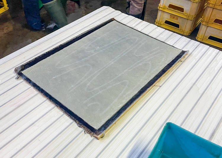 Then, lay it on top of the paper and leave to dry