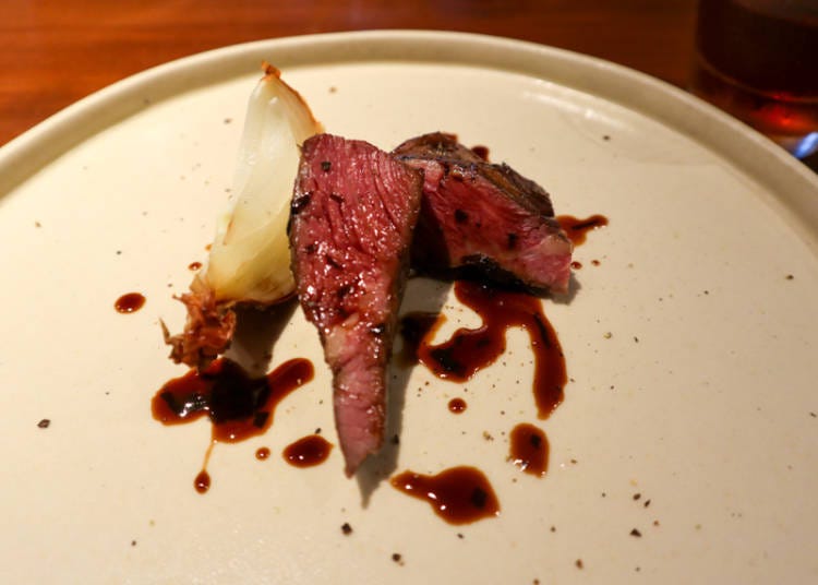 Skirt steak with roasted onion and red wine sauce
