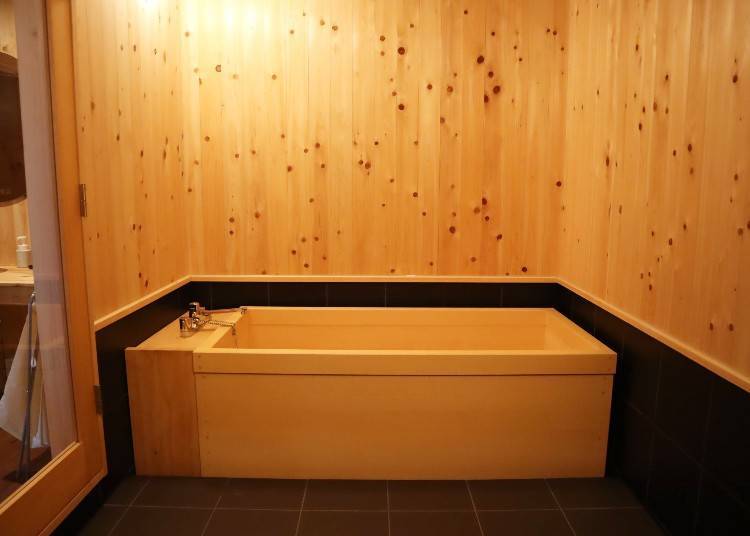 Beautiful hinoki cypress wood bathtub in the MARUJU building