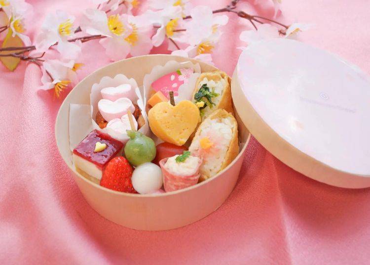 Each person can enjoy a special box of hanami-themed finger foods.