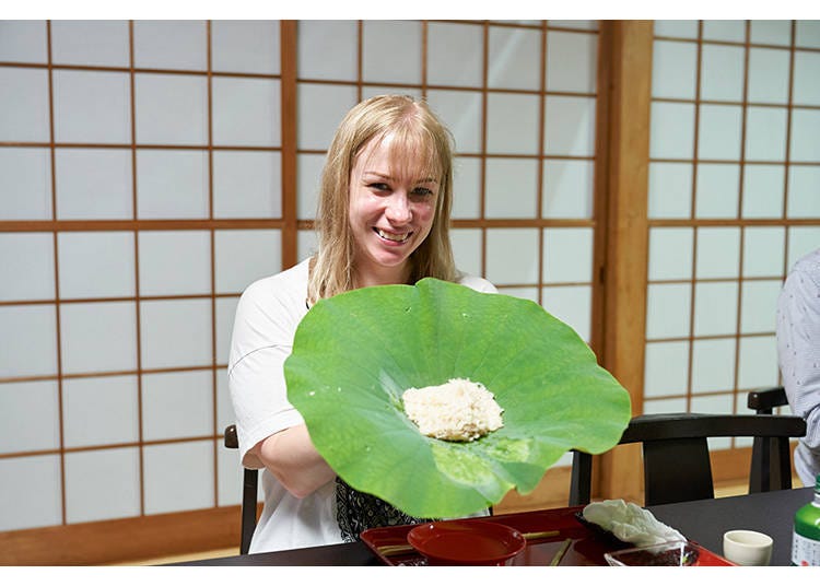 Rice ball served in a huge lotus leaf.