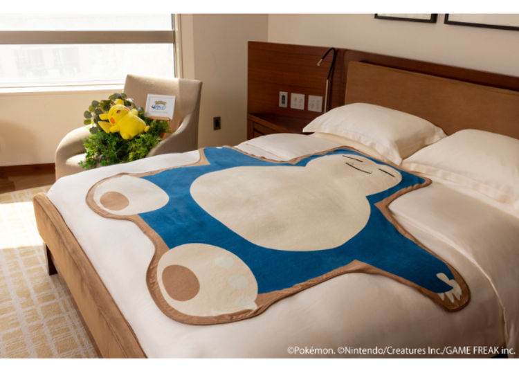A Snorlax blanket to snuggle at the Pokémon Sleep Stay (not to take home)