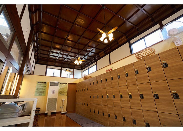 A classic bathhouse with high ceilings and murals