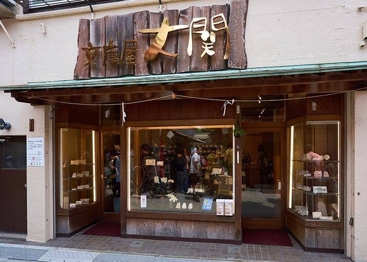 The Asakusa store's traditional facade beautifully complements its historic shopping street setting.