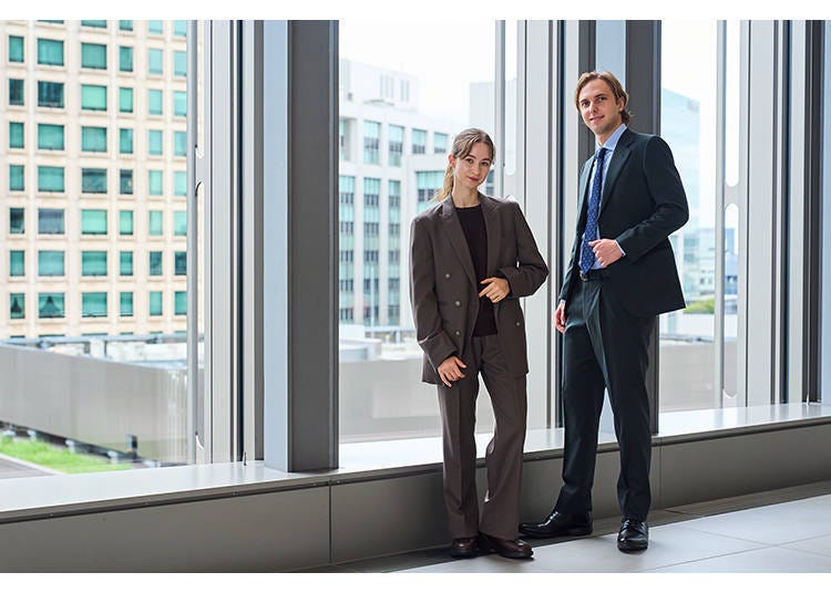 The models are very happy with their first custom-made suits!