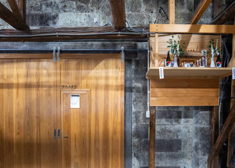 A small shrine (kamidana) dedicated to the deity of sake brewing; these are often found within or on the premises of a sake brewery to pray for safe brewing, high-quality production, and a successful season. (Photo: Timothy Sullivan/LIVE JAPAN)