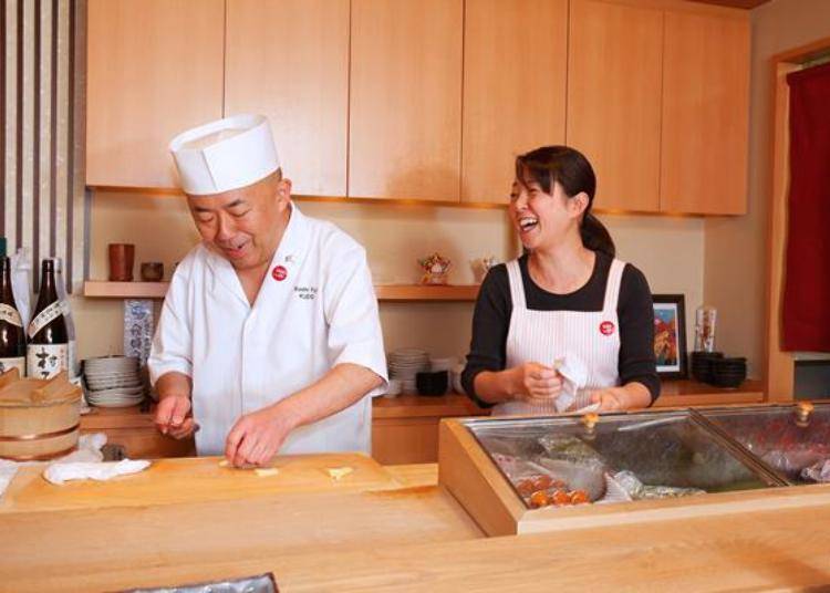 Patrons are attracted to the lively conversation of Mr. Kudo and his cheerful wife