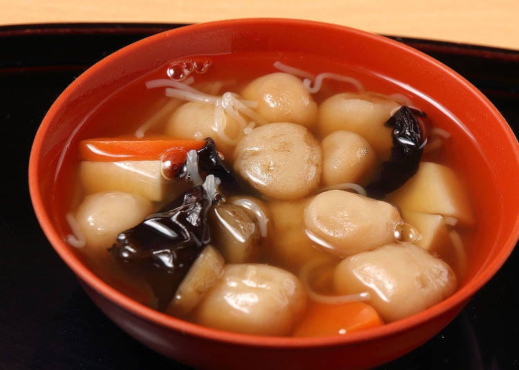 Kozuyu is a soup stock made from dried scallops with burdock, carrots, wood ear mushrooms, and shiratama (rice flour dumplings).