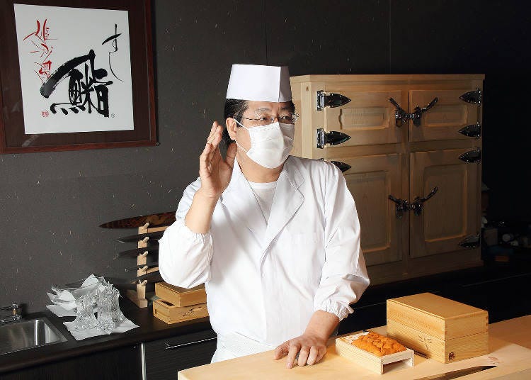 Talking to Mr. Tanaka with his custom-made ice box in the background