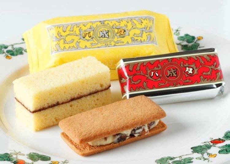 ▲葡萄奶油夹心饼干（含税125日元、奶油巧克力夹心蛋糕（マルセイバターケーキ）含税125日元