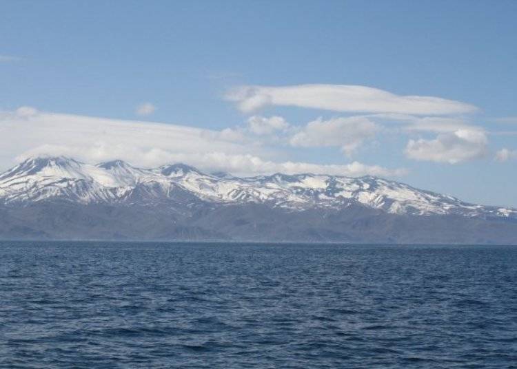 View of the Shiretoko mountains from the east side of the Shiretoko Peninsula from the Rausu Sea. Life here is vibrant on both land and ocean.