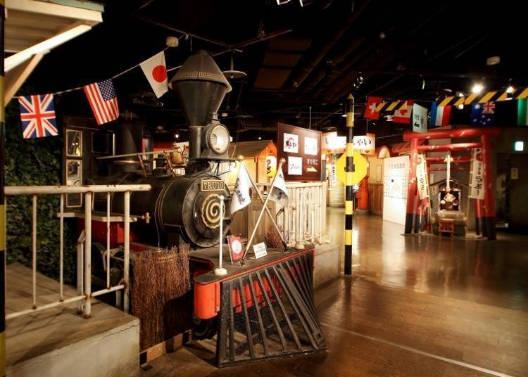 A steam locomotive monument inside the facility. This is a very popular spot among tourists for taking pictures