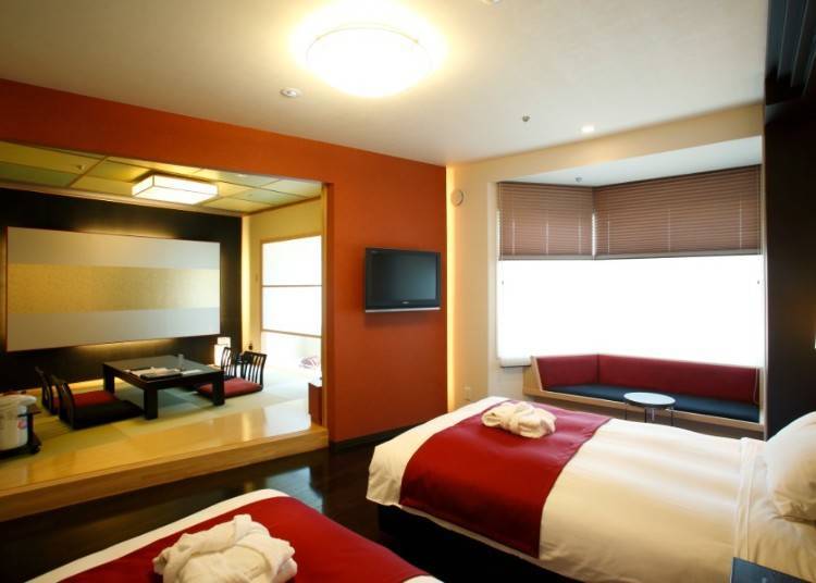 A modern style guestroom having Japanese and Western rooms.