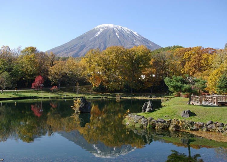 Fukidashi Park in fall. The charming reflection of Ezo Fuji turned upside down.