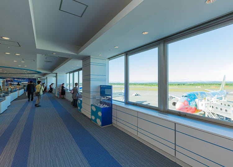 From the corridor you can view the runways and boarding bridges connected to planes