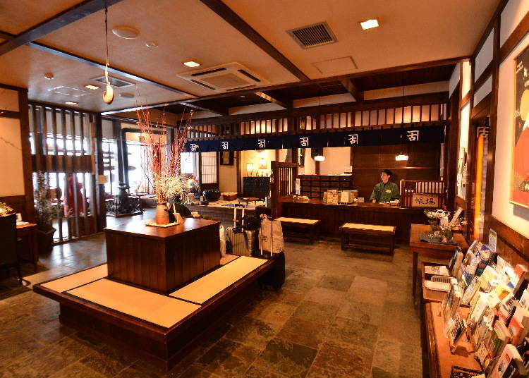 The lobby and front desk reproduce a merchant house of the Meiji period