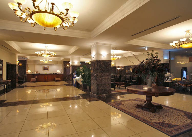 The inside of Hotel Neuschloss Otaru with its solemn atmosphere and old Vienne-inspired castle style