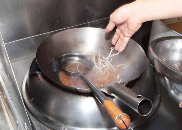 Once the soup and sauce have been mixed together bean sprouts are added