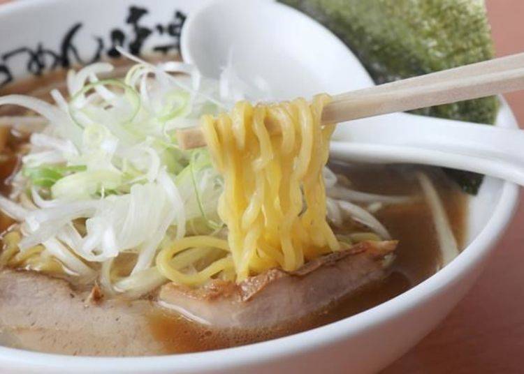 The fat, curly noodles go perfectly with the rich, flavorful soup!