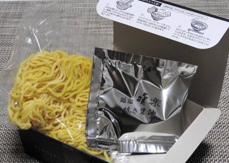 Each box contains a packet of raw noodles and pouch of soup