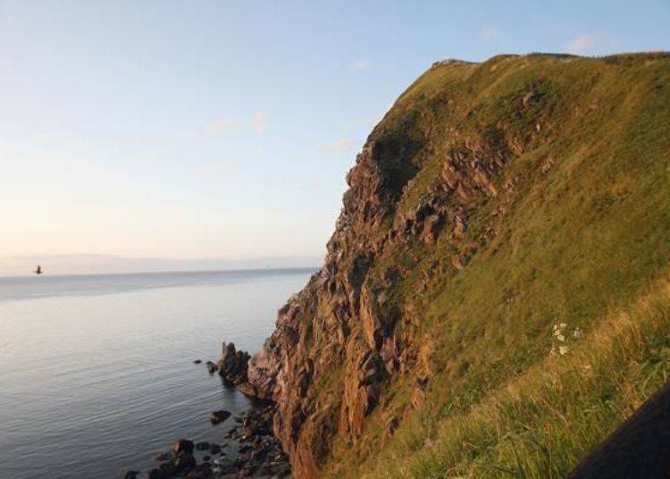 There the gigantic rock formation of Cape Peshi will suddenly come into view.