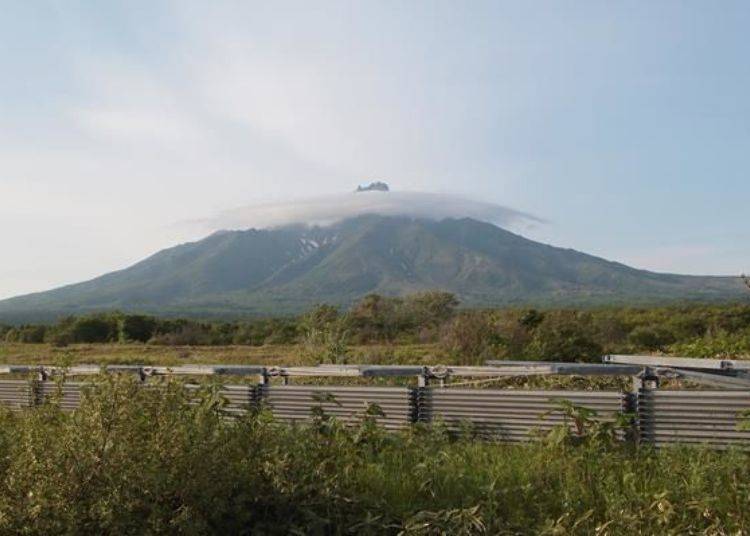 The mountain viewed from near the parking lot of the museum looks forbidding