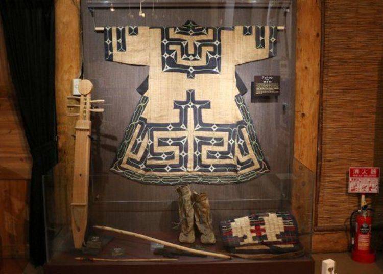 This exhibit displays clothing such as the "attush," a shirt made of tree bark, and "cep-keri," shoes made of salmon skin. You can tell the Ainu made good use of all the nature around them in their daily lives.