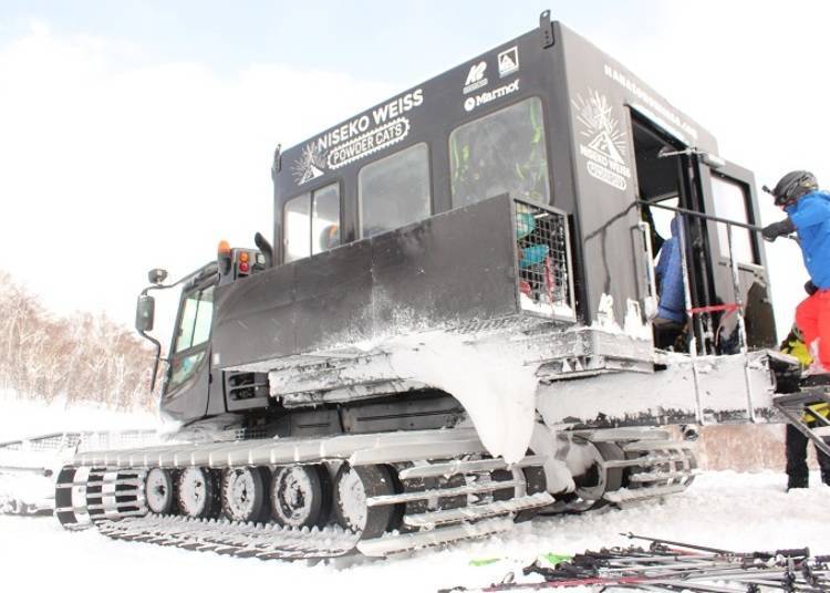 Boarding the cool-looking black CAT before setting out