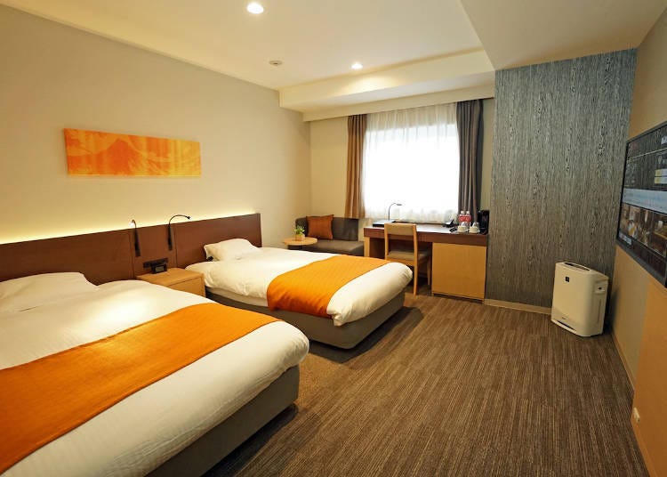 以溫暖、安心、和風為主題的設計舒適雙人床房（照片客房的一例）