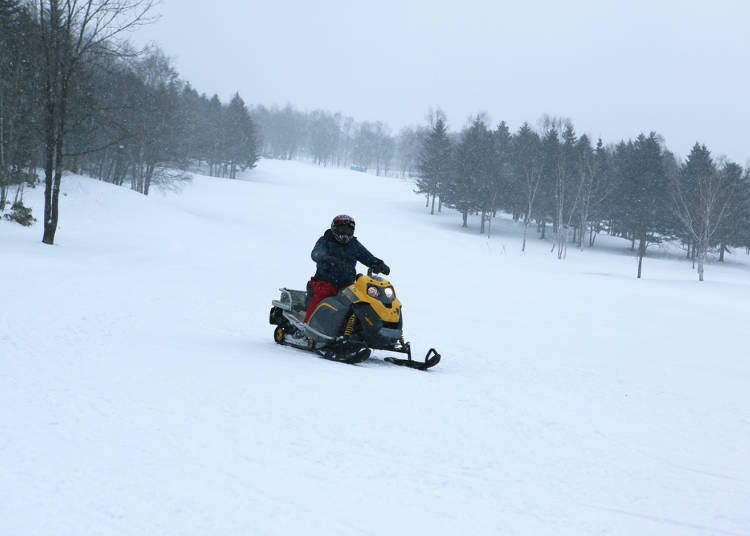 4. Snowmobiling: Sprint through the snow fields on a snowmobile or a snow raft!