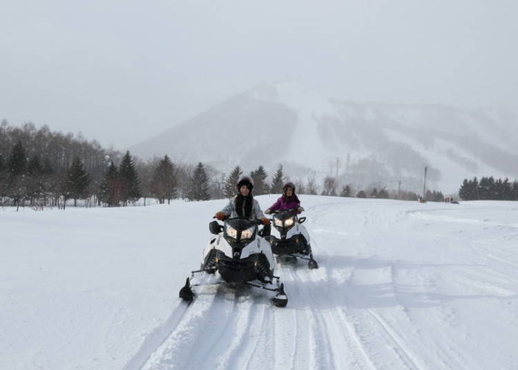 1. Get That Heart Pumping! Snowmobile through the Vast Snow Fields