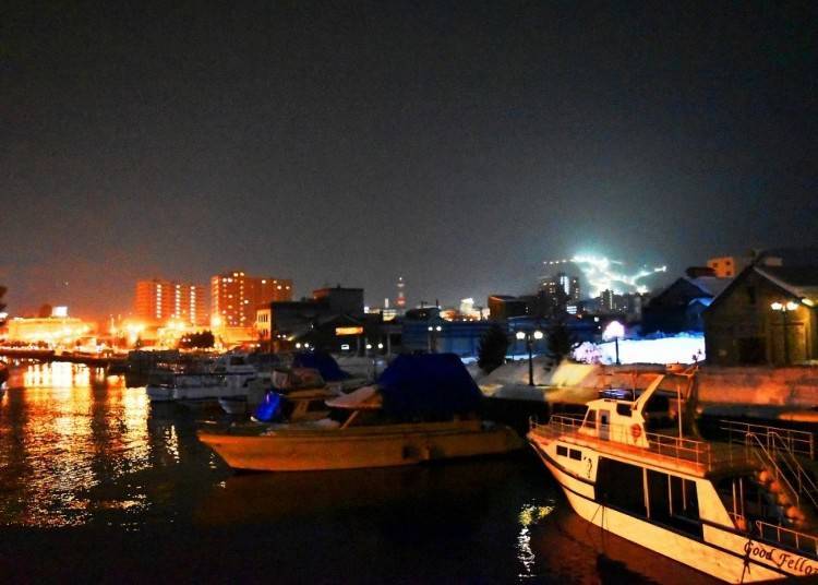 Night view of the North Canal and the illuminated ski slopes