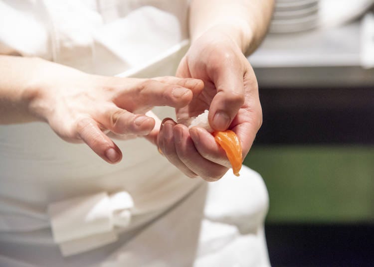 Sushi are prepared by hand by the professionals