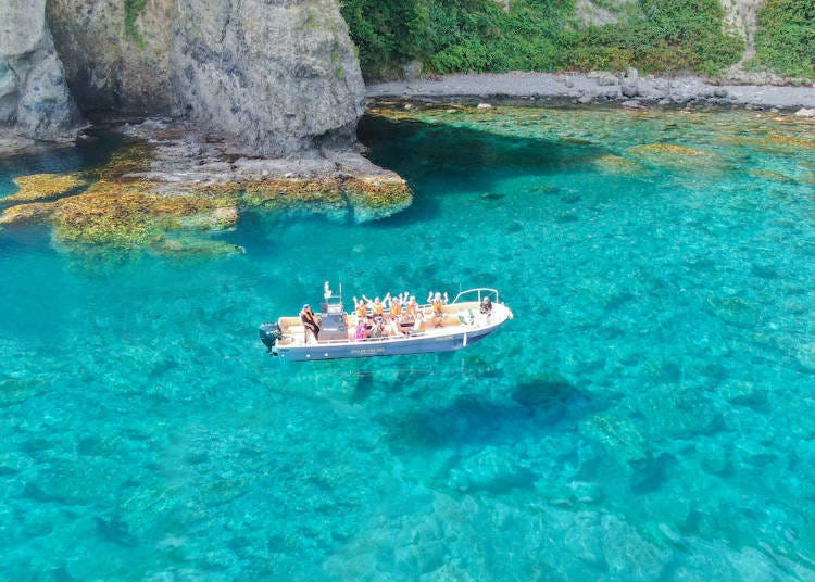 The clear waters are one of Iwabe Coast’s features