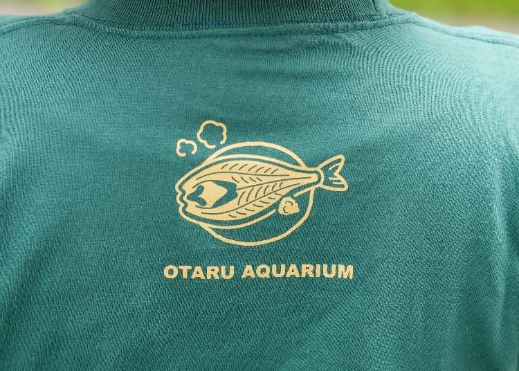 On the back of the shirt is an Ohoktsk atka mackerel sliced open!