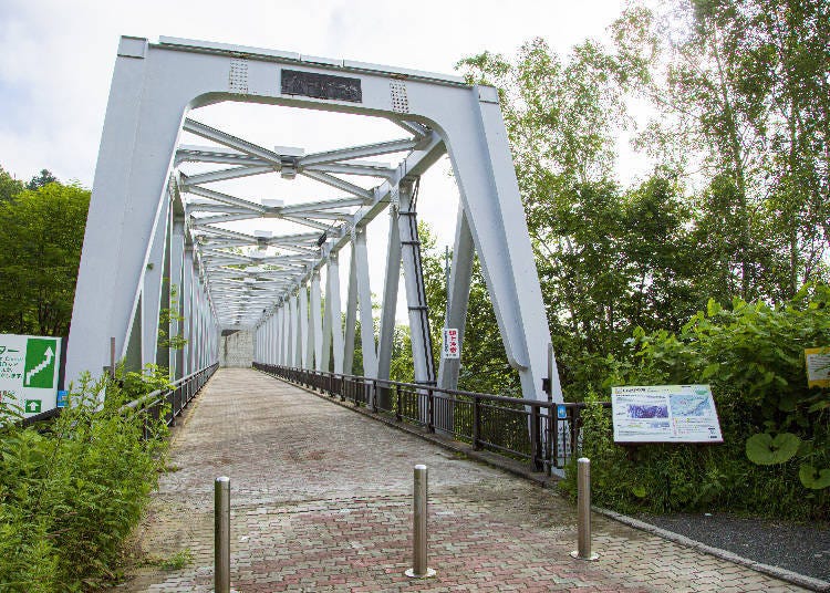 The Blue River Bridge stretches across the Biei River