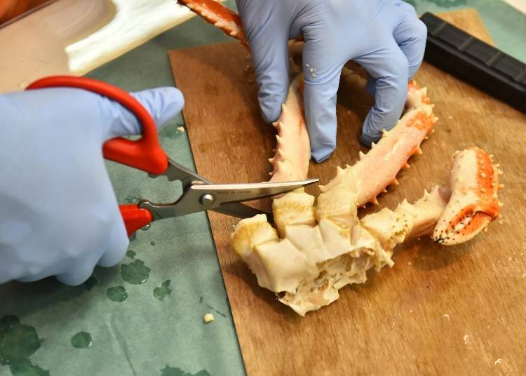 Put scissors on the joint at the base of the leg and snip it off.