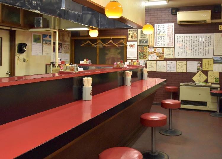 Eye-catching polished red counter and tables