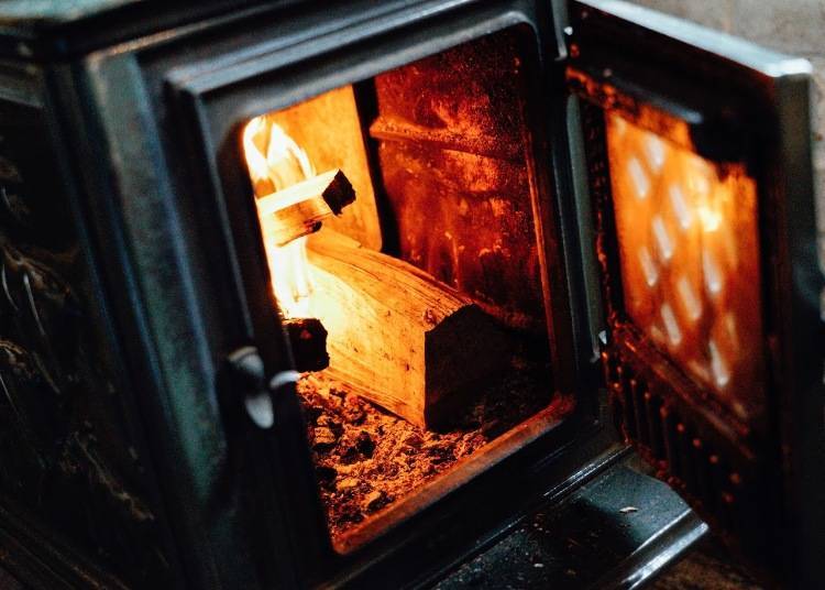 9. Relax in a cafe with a wood-burning stove