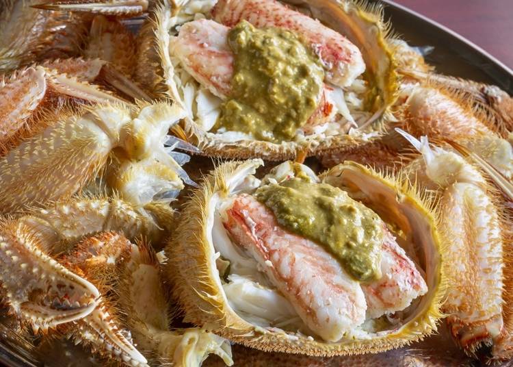Why do the people of Hokkaido eat hairy crabs?