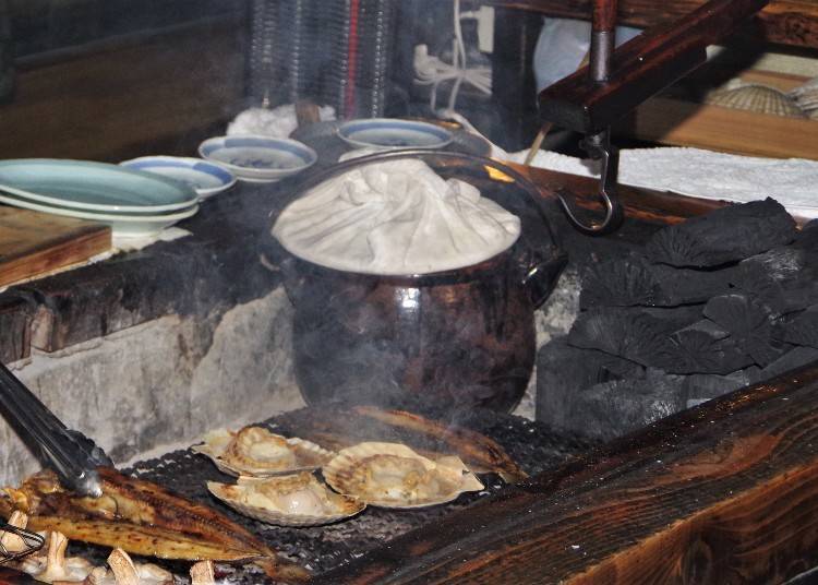 The sake is constantly heated on the Irori in a special pot, and is served as orders come in.