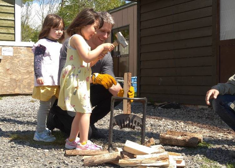Try your hand at wood cutting for the open-air fires (Photo courtesy of Takibi Camp)