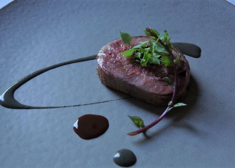 An example of a meat dish, Akahira squab with truffle coulis (Photo: Chimikepp Hotel)