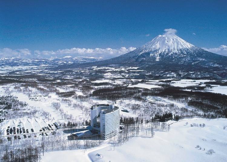 Vast slopes expand before the hotel, with Mt. Yotei looming in the background (Image: Hilton Niseko Village)