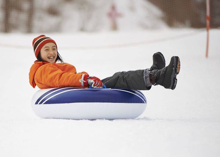 Tubing is super popular with children and adults alike! (Image: Greenpia Onuma)