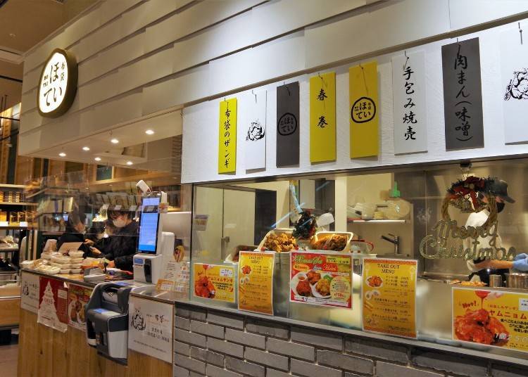 The Take-out Hotei sales corner, lined with samples of each takeout product.