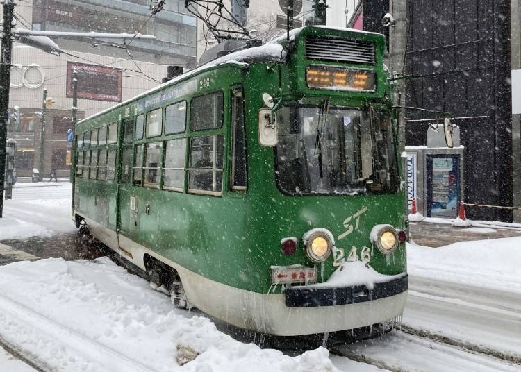 A tram running through the snow — a scene unique to snowy northern Japan.