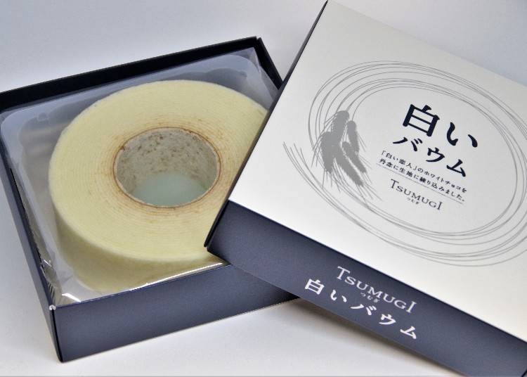 Open the box to reveal the pure white baumkuchen inside! It's a tempting treat with a strong visual impact.